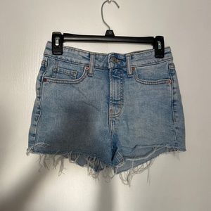 blue denim distressed shorts